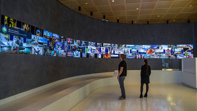 LED video walls displaying content in a museum